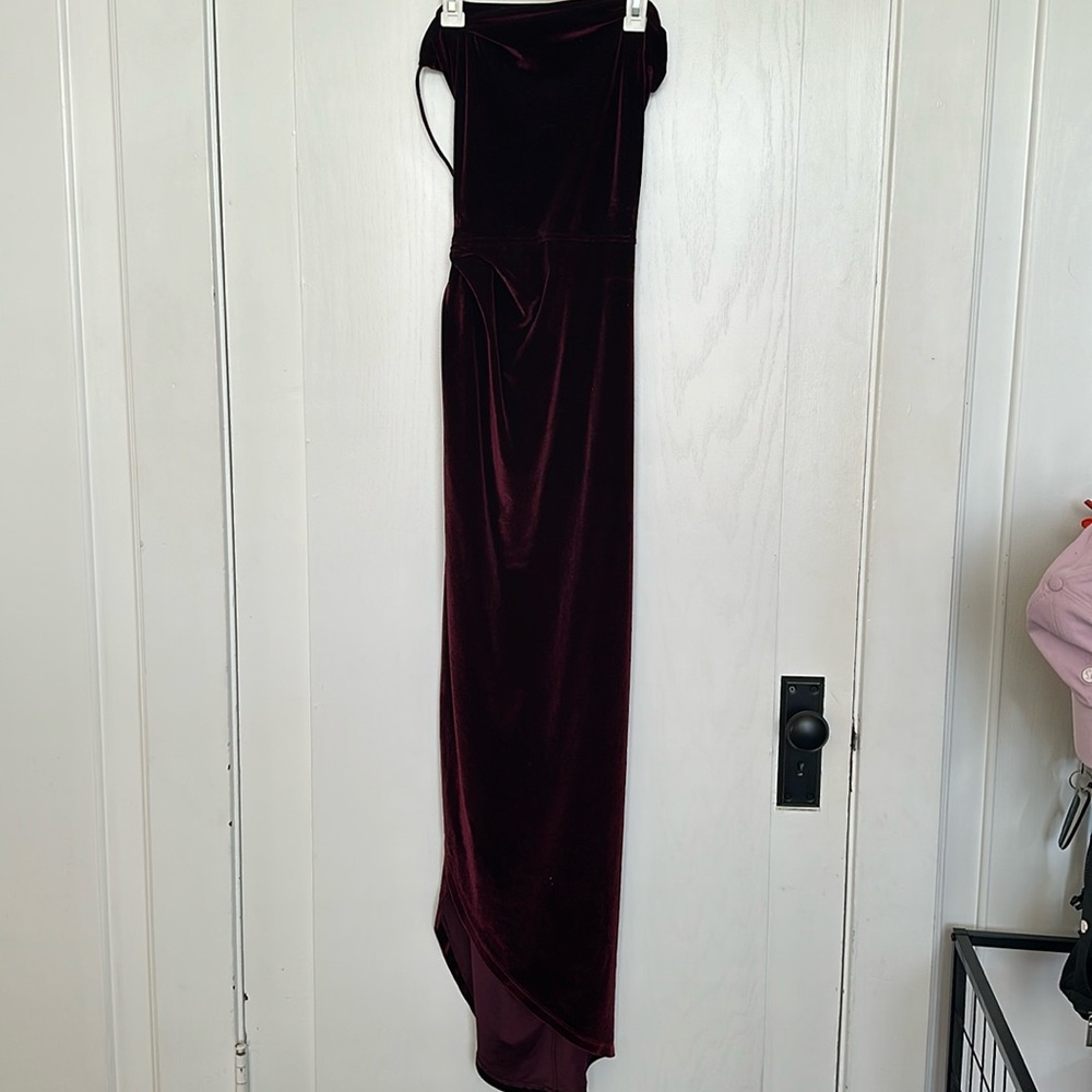 Burgundy velvet floor length with leg slit and open back dress!